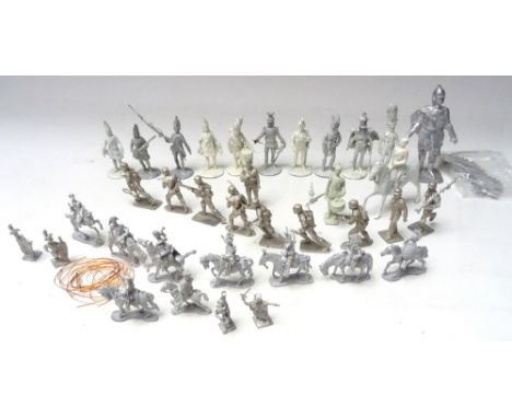 Unpainted models 90mm scale Polish Hussar, dismounted, twelve 54mm, mostly Napoleonic, ten 50mm German WWII Infantry, seven 3