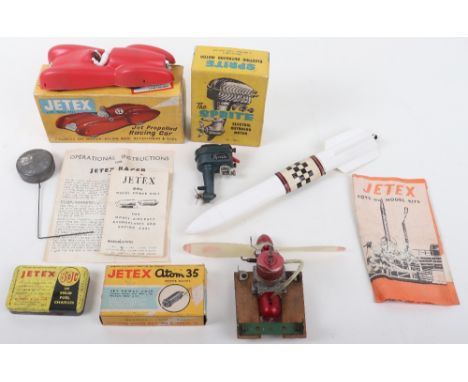 Jetex Propelled Racing Car, red plastic body, instruction leaflets, pylon box, in very good original used condition, plus a b