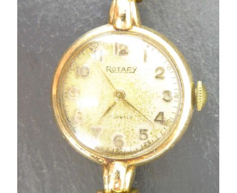 ROTARY; a ladies' vintage 9ct gold wristwatch with crown wound movement, the circular dial set with Arabic numerals, on a 9ct