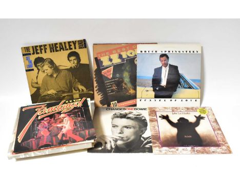 A large collection of 12" records to include Bob Marley 'Legend', Chairmen of the Board 'Bittersweet', Bob Dylan 'Biograph', 