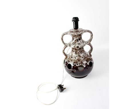 A West German ceramic twin handled lamp base, brown ground with white drip glaze decoration, with double light fitting, 40 x 