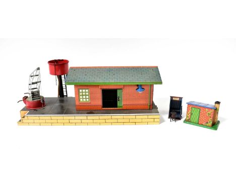 HORNBY; O gauge No. 2E Goods depot building with a boxed railways accessories No. 7 watchmen's hut, brazier, shovel and poker