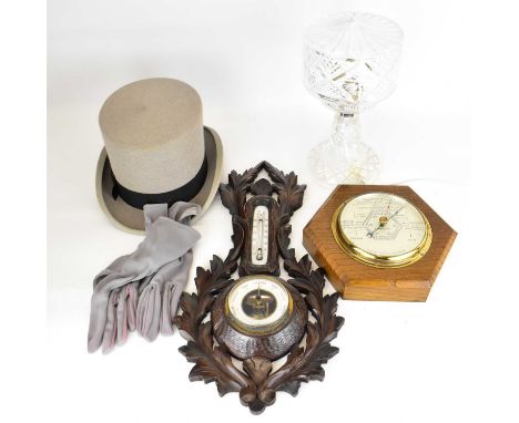 Two wall mounted barometers, one Black Forest style, unmarked with thermometer, length 46cm, together with a Short &amp; Maso