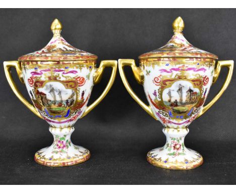 ROYAL VIENNA; a pair of 19th century vases of trophy form with covers, hand painted with harbour scenes, gilt highlighted wit