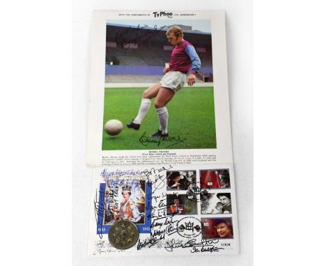 WORLD CUP 1966; a first day cover with commemorative medallion bearing signatures to include Roger Hunt, Martin Peters, Nobby