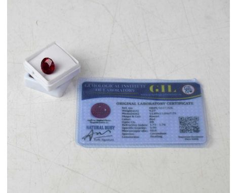 A loose 9.27 carat round ruby with GIL Laboratory Certificate.
