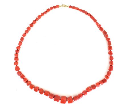 A vintage red coral necklace with gold-coloured ring clasp, length 58cm.