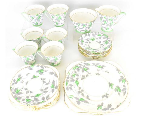 A twenty-one piece Royal Grafton Art Deco inspired bone china tea service comprising six cups, six saucers, six side plates, 