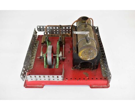 A vintage stationery engine steam plant comprising horizontal boiler and double cylinder mill engine.