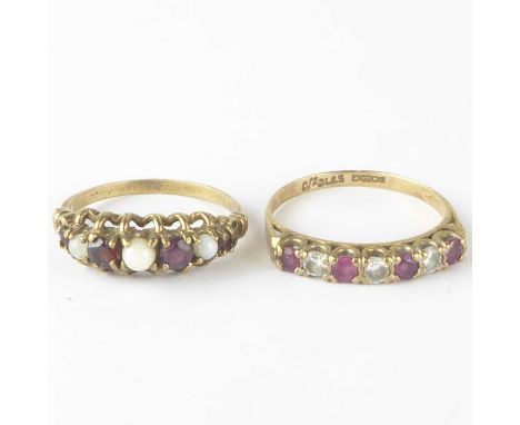 Two 9ct gold dress rings, one with four small rubies separated by three small white stones, size O, the other set with four r