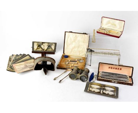 A collectors' lot to include costume jewellery, hallmarked silver opera glasses, a Hohner harmonica, a slide viewer with card