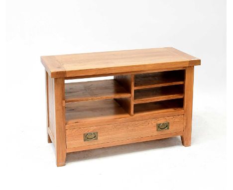 A modern oak joint side table with open drawers above a cupboard door, on stile feet, 69 x 110 x 51cm.