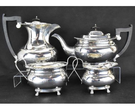 VINERS LTD; a George V hallmarked silver four-piece tea service comprising teapot, length 31cm, approx. 25.4ozt, coffee pot, 