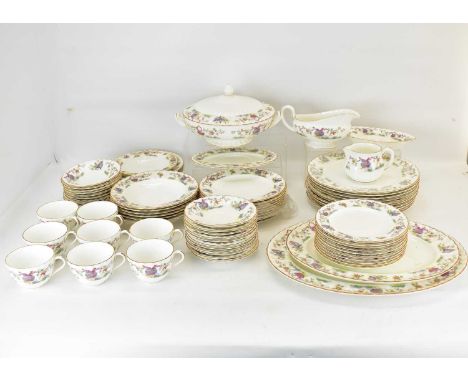 ROYAL WORCESTER; a seventy-five piece dinner service to include dinner plates, side plates, cups, saucers, serving plates, gr