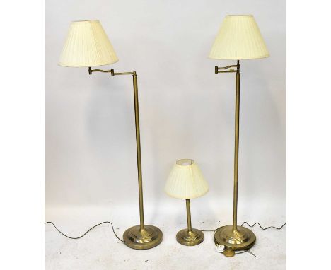 Two modern standard lamps with lamp fitting on extending right-angled arm, height 140cm, together with a similar table lamp, 