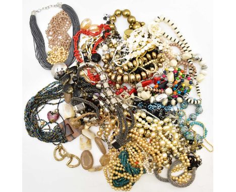 Various items of modern and vintage costume jewellery to include earrings, brooches, necklaces, etc.