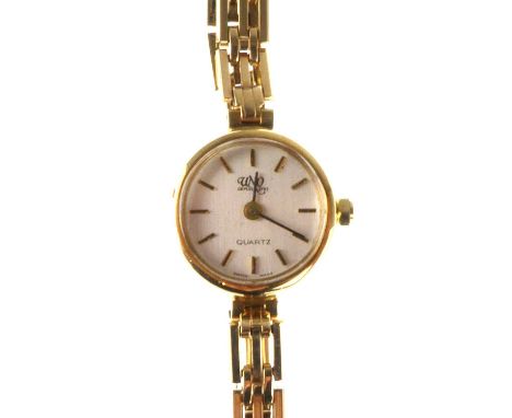 UNO; a ladies' 9ct gold wristwatch, the silvered dial set with baton numerals, quartz movement, on a 9ct gold gate link brace