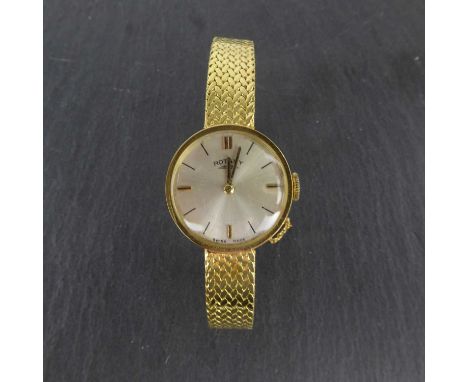 ROTARY; a ladies' vintage 18ct gold wristwatch, the silvered dial set with raised baton numerals, seventeen jewel crown wound