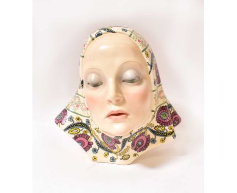 LENCI; a hand painted bust of a young woman in floral headscarf, by Helen Konig Scavini, marked to base Lenci Made in Italy 1