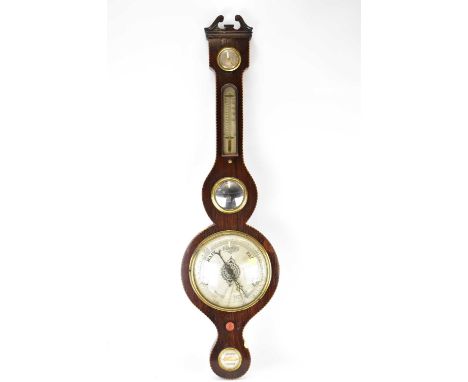 A Victorian mahogany banjo barometer with silvered dial, level gauge to the bottom, thermometer and smaller gauge to the top,