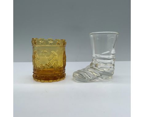 One crafted in the shape of a clear boot with a horseshoe engraving, alongside another in vibrant yellow adorned with low-rel