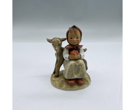 Beautifully hand painted porcelain figurine of a charming little girl holding a small floral bouquet that matches her red dot