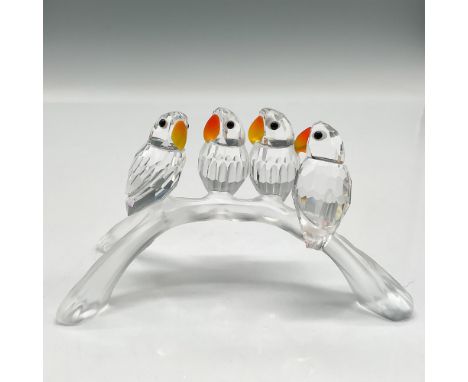 Part of the Feathered Beauties theme group. Four faceted clear crystal figures perched on a frosted three-pronged arch branch