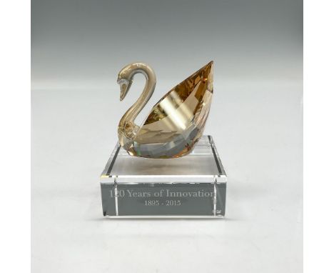 Commemorating the 120th anniversary of Swarovski, 1895 - 2015. Made from faceted crystal and finished with golden shine coati
