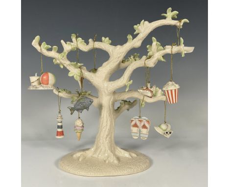 Summer tree created with green leaves and branches to be decorated with the 12 summertime ornaments included - fish, sandcast