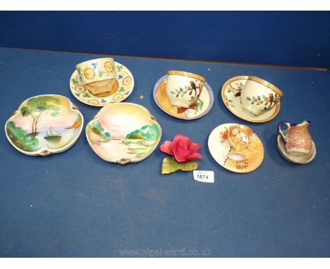 A small quantity of oriental china including hand painted fluted rim trinket bowls, egg cup and saucer (a/f), three cups and 