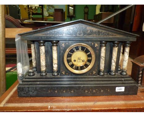 A heavy black marble Clock with columns, a/f, 20 1/2" wide x 7 1/2" deep x 12 3/4" tall. (key in office)