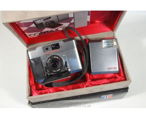A Contax T Compact 35mm Range Finder Camera in titanium finish having Carl Zeiss Sonnar 38mm f/2.8 T* Lens, No.049343, comple
