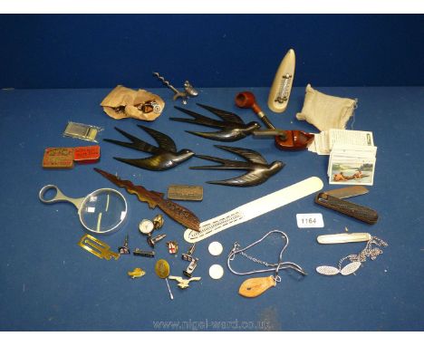 A quantity of miscellanea including wooden Swallow bird plaques, W.A &amp; A.C Churchman cigarette cards, valve caps, gramoph