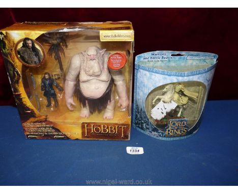 Three boxed figures from Lord of the Rings:  Goblin King, Gandalf and Thorin Oakenshield.