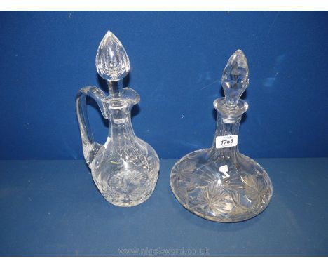 A cut glass ship's Decanter and ewer style decanter.