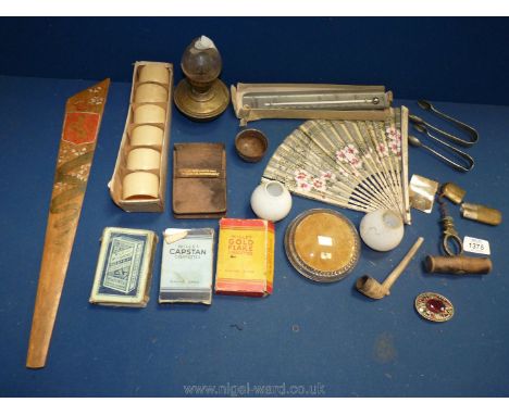 A quantity of miscellanea including four packs of playing cards, cork screw, serviette rings, an old clay pipe and two EPNS s