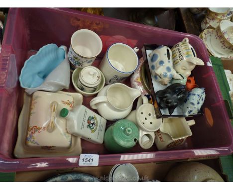 A quantity of china including a Poole Pottery conch shell,  Wade jug, Sylvac style preserve pot, large Crown Devon mug, 1937 