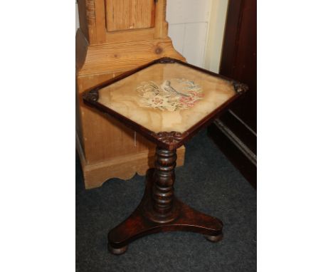 A Victorian simulated rosewood occasional table with rectangular glazed tapestry top, on turned pedestal and platform base, 3