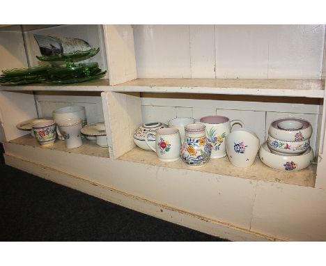 A collection of Poole Pottery, including vases, tankards, a jardiniere and a jug, in various designs (a/f)