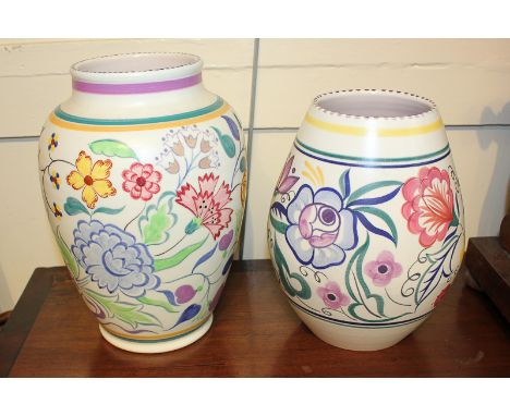 Two large Poole Pottery vases, both with floral designs and multi line borders, tallest 24cm