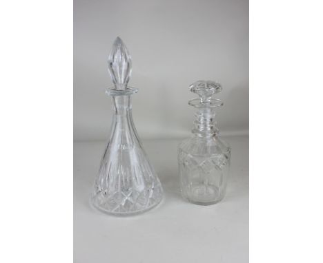 A Regency style glass decanter, mallet form, together with a bottle shaped decanter, tallest 31.5cm including stopper