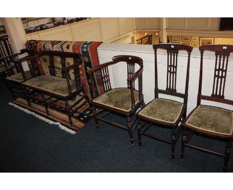 An Edwardian mahogany seven piece salon suite of small settee, 106cm, four chairs and two tub chairs with pierced panel backs