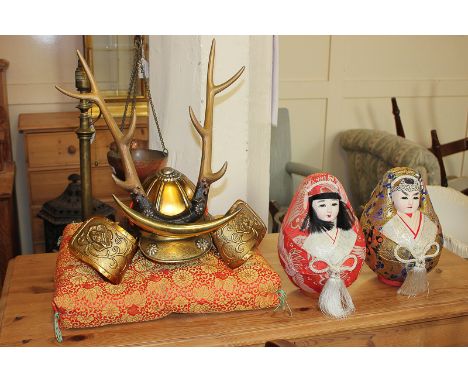 A 20th century Japanese replica Samurai helmet with detachable metal antlers and commemorative plaque by Hitachi Kanagawa Shi