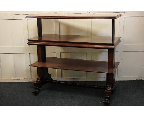 A Victorian mahogany metamorphic three-tier buffet with retractable action to form a rectangular side table, on end supports 