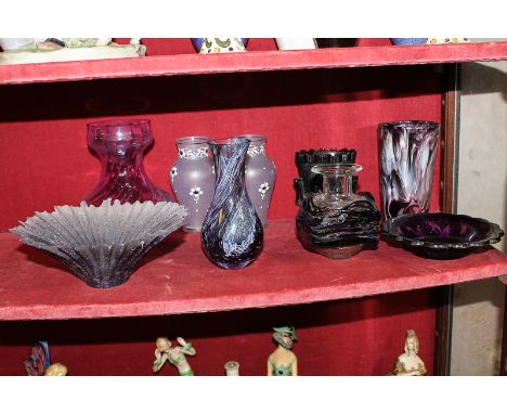 An amethyst frosted glass bowl with other amethyst glass items including a pair of vases, marble effect beaker, Mdina scent b