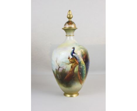 An early 20th century Royal Worcester porcelain lidded vase decorated with peacocks, signed Lewis, green printed mark, date c