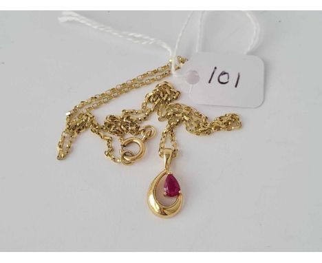 A 9ct ruby pendant on 9ct chain 3.1ginc