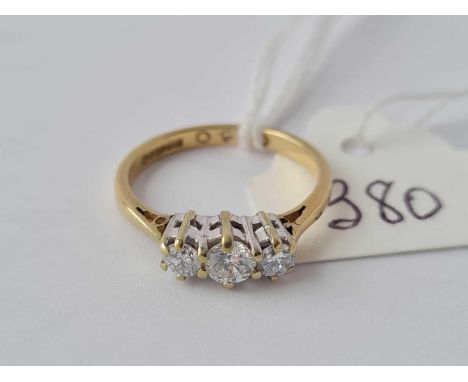 A three stone diamond ring (0.50 ct) 9ct gold - size K - 2.1 g.