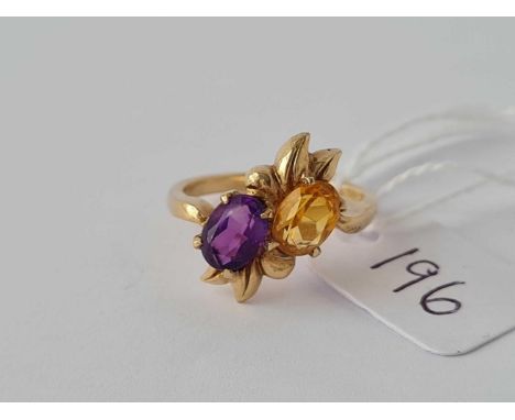 A purple and yellow stone ring 9ct - size M - 3.2 g.