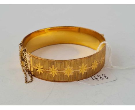 A rolled gold bangle
